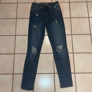 High rise dark denim ripped skinny jeans